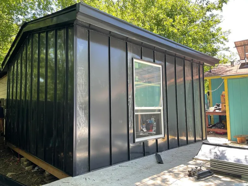 Black standing seam metal wall panels for Metal Roof Installation in Three Rivers