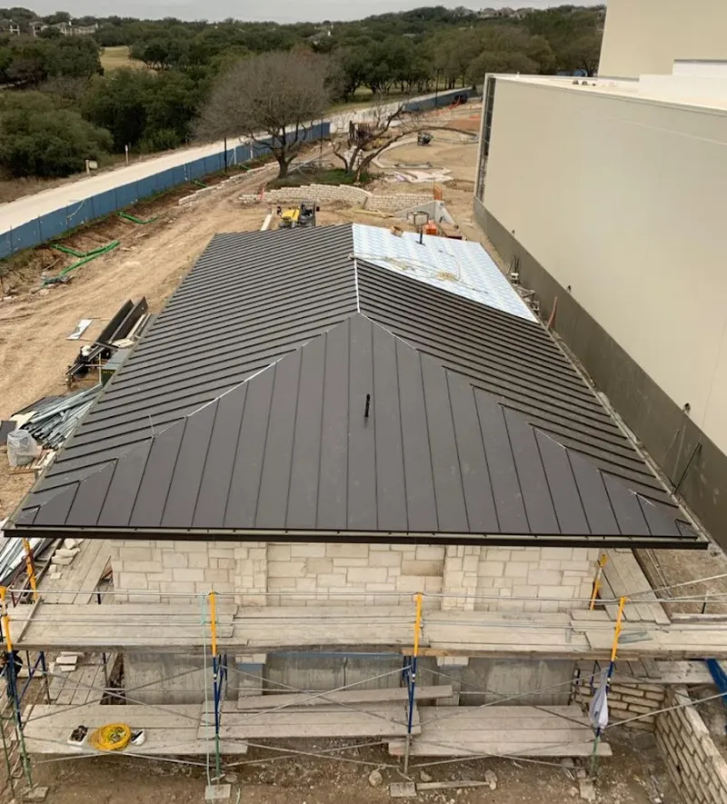 Metal roof new construction with scaffolding in Three Rivers